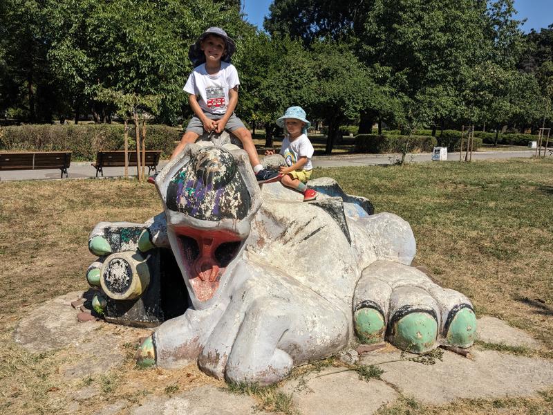 Playing on the sculptures in the park